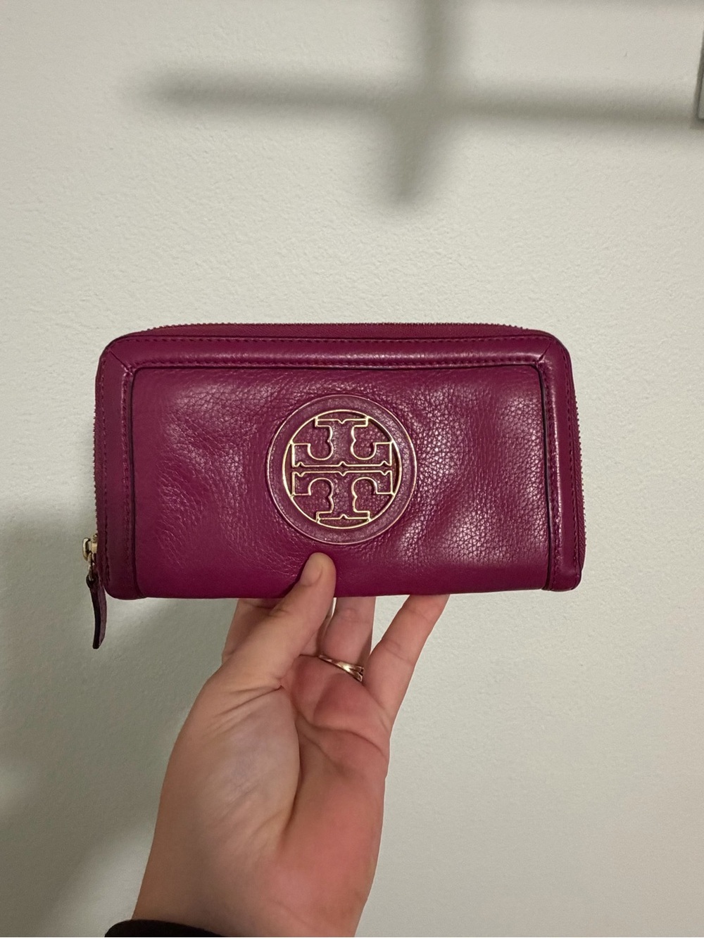 Tory Burch Zip-Around Wallet in Deep Berry with Gold Logo